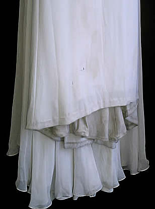 Dirty Dress before cleaning with stains on the trail